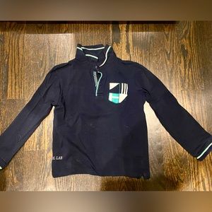 Nukutavake long sleeve Size 8 polo shirt w cool sports detailing. Worn once.
